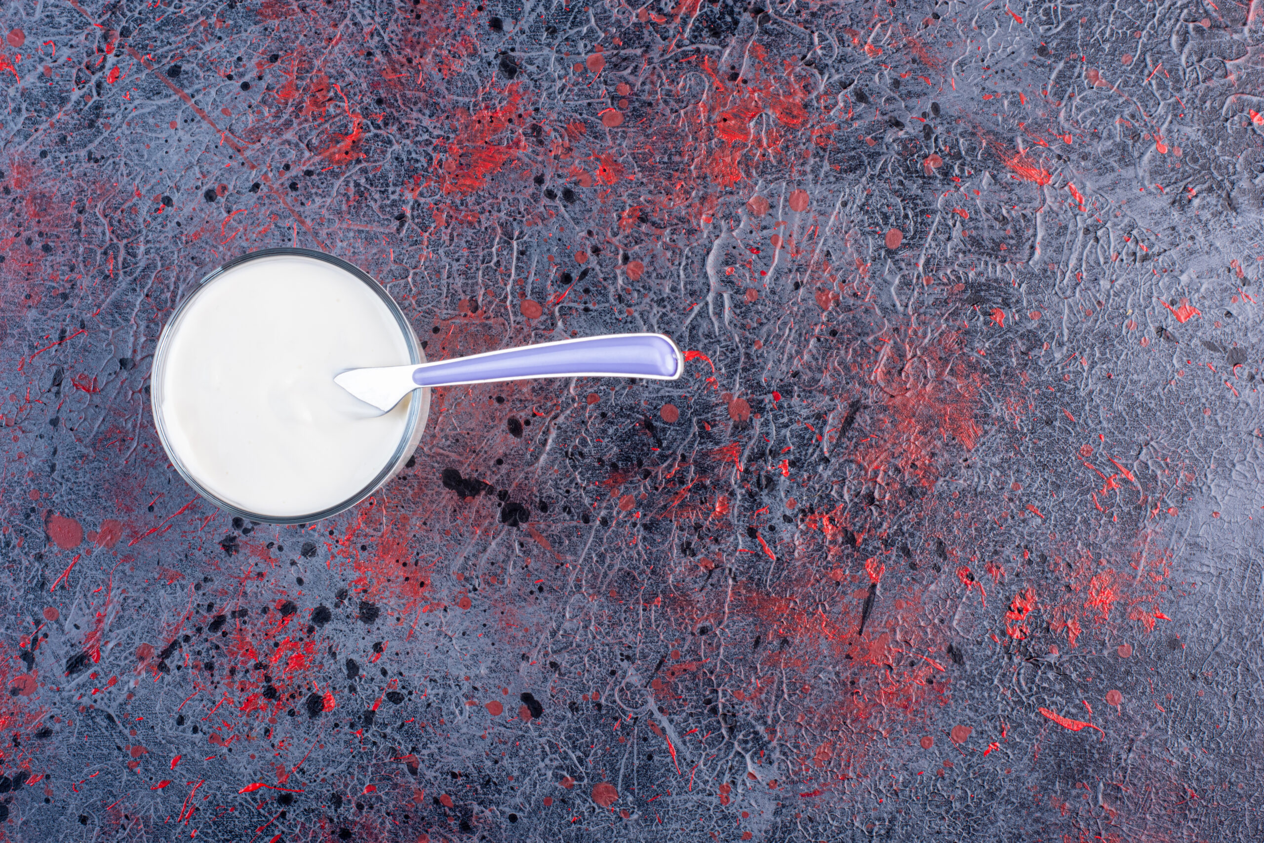 Cream cheese or yogurt in a glass cup. High quality photo